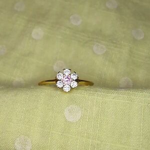 Pink center stone flower ring